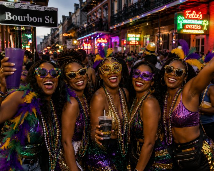 Masks, beads and feathers on Bourbon Street